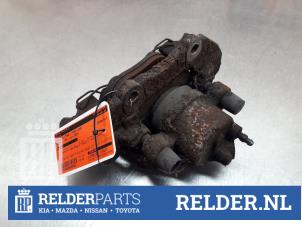 Używane Zacisk hamulcowy lewy przód Mazda 3 (BL12/BLA2/BLB2) 2.0i MZR DISI 16V Cena € 45,00 Procedura marży oferowane przez Relder Parts B.V.