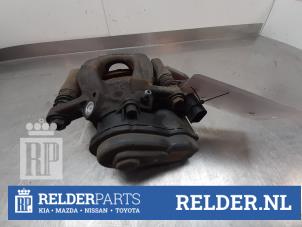 Gebruikte Remklauw (Tang) links-achter Nissan Qashqai (J11) 1.6 DIG-T 163 16V Prijs € 40,00 Margeregeling aangeboden door Relder Parts B.V.