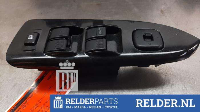 Brytare, eldrivna fönster från en Mazda 323 (BJ12) 1.6 16V 2001