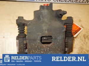 Gebruikte Remklauw (Tang) links-voor Nissan Pixo (D31S) 1.0 12V Prijs € 25,00 Margeregeling aangeboden door Relder Parts B.V.