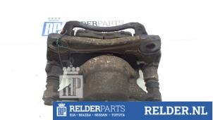 Begagnade Främre bromsok, höger Toyota Corolla (E11) 1.6 16V Pris € 45,00 Marginaltabell erbjuds av Relder Parts B.V.