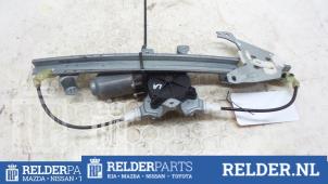 Gebruikte Raammechaniek 4Deurs links-achter Nissan Primera Wagon (W12) 1.8 16V Prijs € 36,00 Margeregeling aangeboden door Relder Parts B.V.