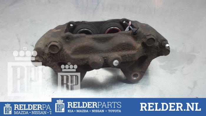 Remklauw (Tang) rechts-voor van een Toyota Land Cruiser (J12) 3.0 D-4D 16V 2008