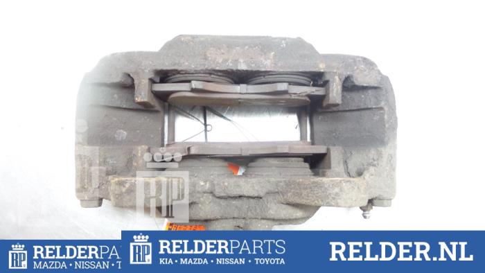 Remklauw (Tang) rechts-voor van een Toyota Land Cruiser (J12) 3.0 D-4D 16V 2008