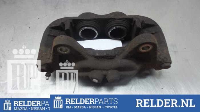 Remklauw (Tang) rechts-voor van een Toyota Land Cruiser (J12) 3.0 D-4D 16V 2008