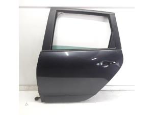 Gebruikte Portier 4Deurs links-achter Renault Grand Scénic III (JZ) 1.4 16V TCe 130 Prijs € 77,49 Margeregeling aangeboden door Reclycar De Boer BV