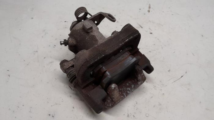 Bakre bromsok, höger från en Audi A1 Sportback (8XA/8XF) 1.4 TFSI ACT 16V 2016