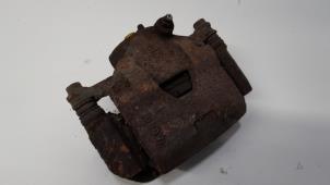 Gebruikte Remklauw (Tang) links-voor Chevrolet Spark (M300) 1.0 16V Prijs € 21,00 Margeregeling aangeboden door Reclycar De Boer BV