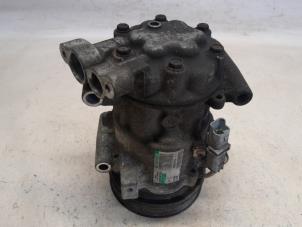 Begagnade Luftkonditioneringspump Renault Clio III (BR/CR) 1.4 16V Pris € 78,75 Marginaltabell erbjuds av Reclycar De Boer BV