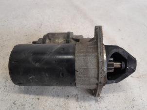 Begagnade Startmotor Opel Corsa D 1.2 16V Pris € 26,25 Marginaltabell erbjuds av Reclycar De Boer BV