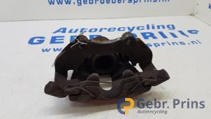 Gebruikte Remklauw (Tang) rechts-voor Ford Focus 3 Wagon 1.6 SCTi 16V Prijs € 30,00 Margeregeling aangeboden door Autorec. Gebr. Prins b.v.