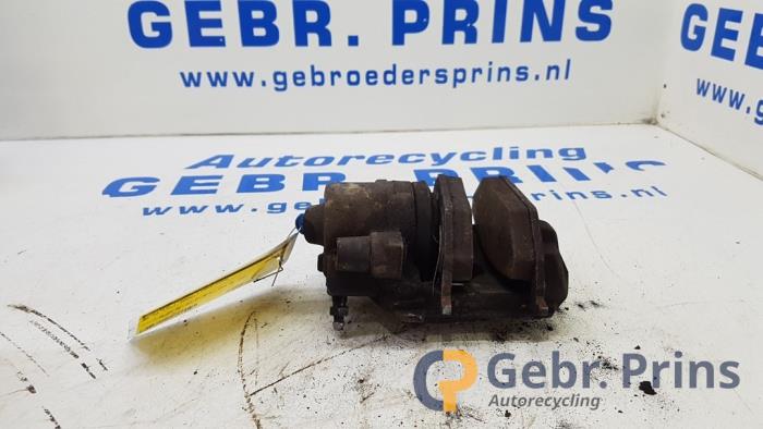 Främre bromsok, vänster från en Volkswagen Up! (121) 1.0 12V 60 2020