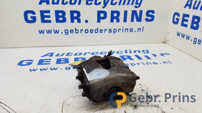 Främre bromsok, vänster från en Volkswagen Up! (121) 1.0 12V 60 2020