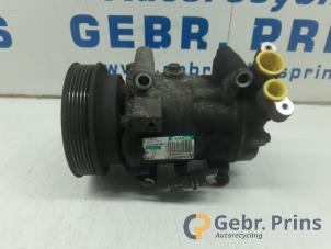 Gebruikte Aircopomp Renault Clio III (BR/CR) 1.4 16V Prijs € 40,00 Margeregeling aangeboden door Autorec. Gebr. Prins b.v.