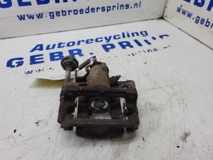 Gebruikte Remklauw (Tang) links-achter Opel Astra J Sports Tourer (PD8/PE8/PF8) 1.6 CDTI 16V Prijs € 50,00 Margeregeling aangeboden door Autorec. Gebr. Prins b.v.