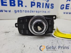 Używane Przycisk I-Drive BMW 7 serie (F01/02/03/04) 740d 24V Cena € 75,00 Procedura marży oferowane przez Autorec. Gebr. Prins b.v.