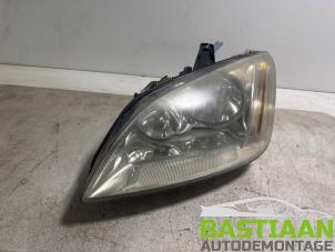 Używane Reflektor lewy Ford Focus C-Max 1.8 16V Cena € 39,99 Procedura marży oferowane przez Bastiaan Autodemontage