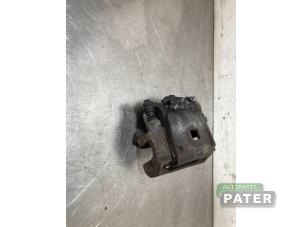 Gebruikte Remklauw (Tang) links-voor Ford Fiesta 6 (JA8) 1.0 SCI 12V 80 Prijs € 21,00 Margeregeling aangeboden door Autoparts Pater