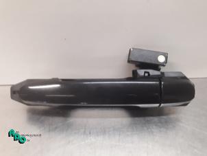 Gebruikte Portiergreep 4Deurs links-achter Toyota Corolla (E12) 1.4 16V VVT-i Prijs € 15,00 Margeregeling aangeboden door Autodemontagebedrijf Otte