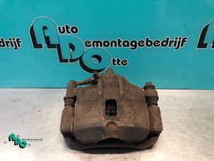 Begagnade Främre bromsok, höger Hyundai Getz 1.4i 16V Pris € 20,00 Marginaltabell erbjuds av Autodemontagebedrijf Otte