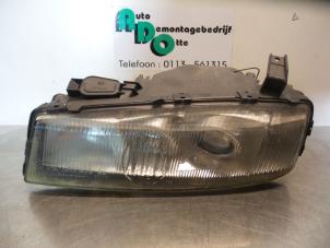 Begagnade Strålkastare, vänster Opel Calibra 2.0i Pris € 50,00 Marginaltabell erbjuds av Autodemontagebedrijf Otte