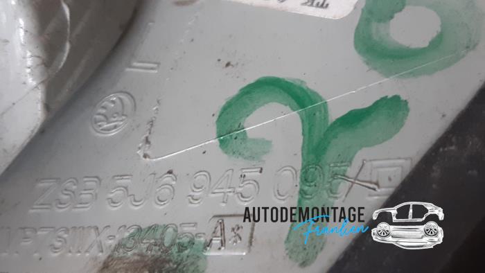 Baklykta, vänster från en Skoda Fabia II Combi 1.2i 12V 2009