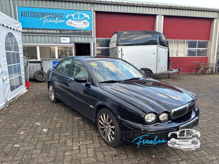 Fönstermekanism för bakre dörr, 4-dörrars, höger från en Jaguar X-type 2.5 V6 24V 2006