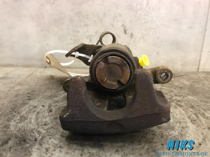 Zacisk hamulcowy lewy tyl z Ford Galaxy (WGR) 1.9 TDI 2004