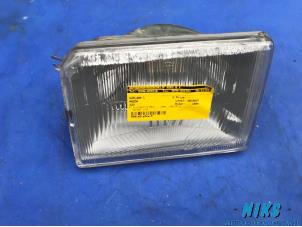Używane Reflektor lewy Mazda 323 Cena na żądanie oferowane przez Niks autodemontage