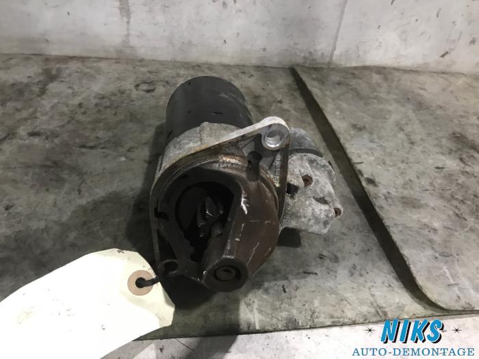 Starter from a Opel Corsa D 1.4 16V Twinport 2007