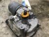 Front wiper motor from a Volkswagen Caddy III (2KA,2KH,2CA,2CH) 1.6 TDI 16V 2014