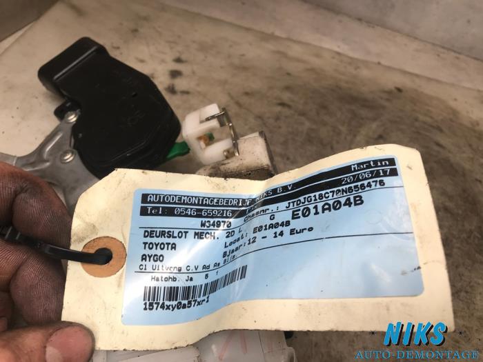 Door lock mechanism 2-door, left from a Toyota Aygo 2012