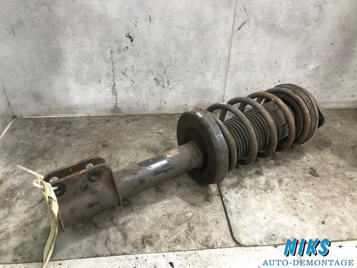 Front shock absorber rod, right from a Opel Corsa B (73/78/79) 1.4i 1997