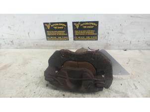 Gebruikte Remklauw (Tang) rechts-voor Ford C-Max (DM2) 1.8 16V Prijs € 25,00 Margeregeling aangeboden door Autodemontage de Zaag