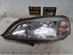 Gebruikte Koplamp links Opel Astra G Caravan (F35) 1.6 GL,Club,Sport,CDX Prijs € 30,00 Margeregeling aangeboden door Autodemontage de Zaag