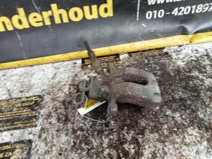 Używane Zacisk hamulcowy lewy tyl Seat Leon (5FB) 1.4 TSI Ecomotive 16V Cena € 35,00 Procedura marży oferowane przez Autodemontage de Zaag