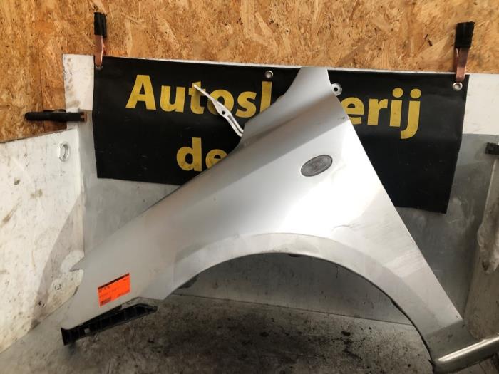 Framskärm, vänster från en Mazda 2 (NB/NC/ND/NE) 1.4 16V 2006