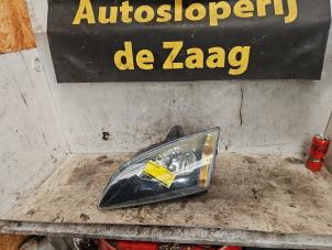Gebruikte Koplamp links Ford Focus 2 1.6 16V Prijs € 40,00 Margeregeling aangeboden door Autodemontage de Zaag