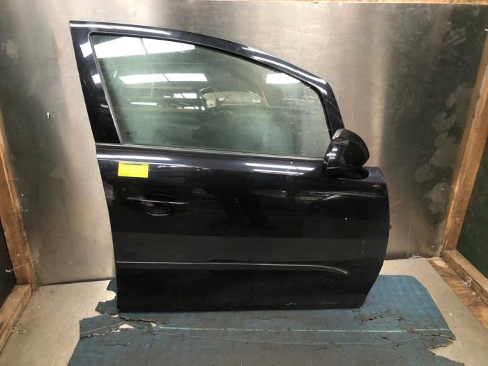 Front wing, right from a Opel Corsa D 1.2 16V 2007