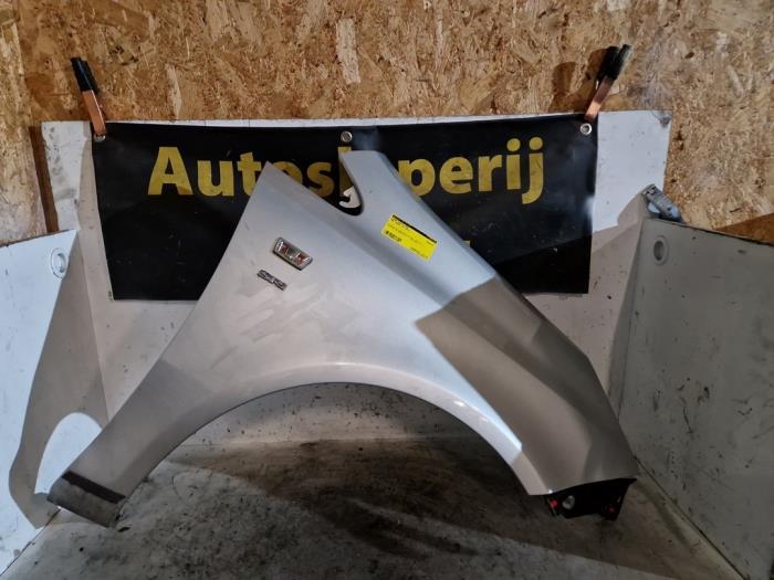 Scherm rechts-voor van een Opel Corsa D 1.4 16V Twinport 2012