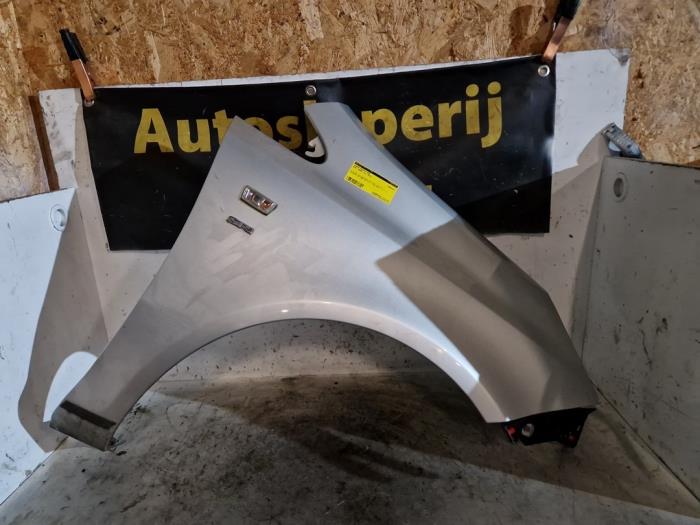 Scherm rechts-voor van een Opel Corsa D 1.4 16V Twinport 2012