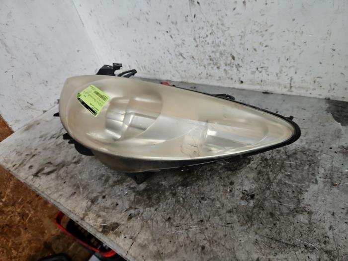 Koplamp links van een Peugeot 307 Break (3E) 1.6 16V 2005