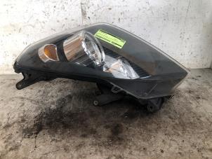 Gebruikte Koplamp links Opel Astra H SW (L35) 1.9 CDTi 100 Prijs € 30,00 Margeregeling aangeboden door Autodemontage de Zaag