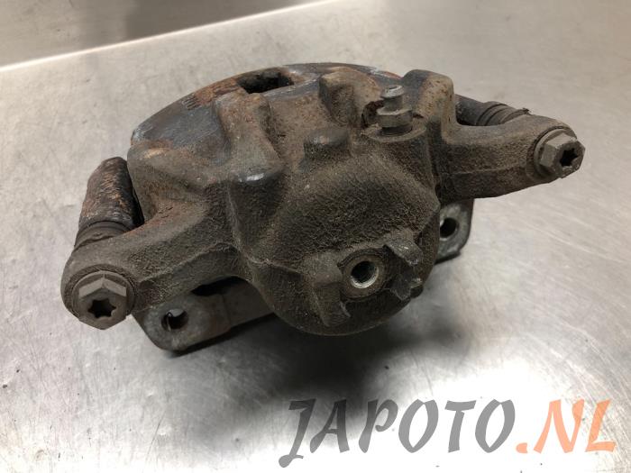 Zacisk hamulcowy prawy przód z Honda Civic (FK/FN) 1.4i Type S 16V 2010