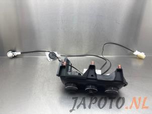 Używane Panel sterowania nagrzewnicy Toyota Yaris IV (P21/PA1/PH1) 1.5 12V VVT-i Cena € 99,95 Procedura marży oferowane przez Japoto Parts B.V.