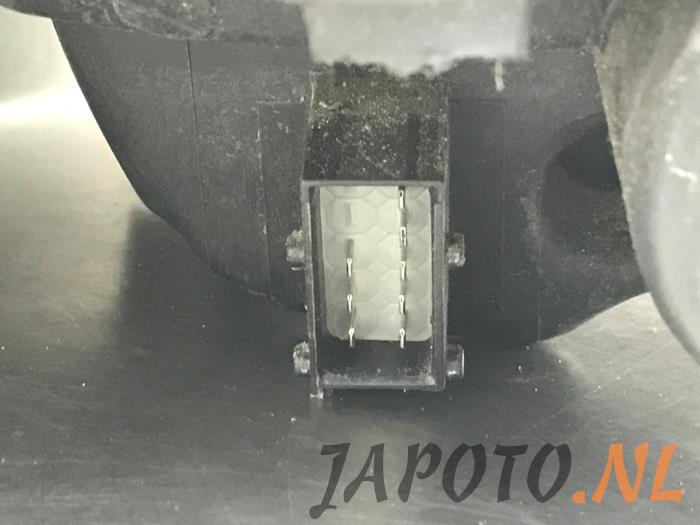 Strålkastare, vänster från en Suzuki Splash 1.0 12V 2011