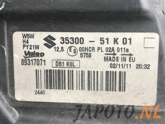 Strålkastare, vänster från en Suzuki Splash 1.0 12V 2011