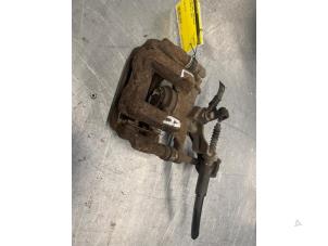 Używane Zacisk hamulcowy lewy tyl Opel Astra J (PC6/PD6/PE6/PF6) 1.4 Turbo 16V Cena € 30,00 Procedura marży oferowane przez Poolman autodemontage