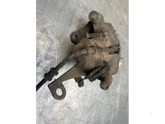 Remklauw (Tang) rechts-achter van een Jaguar XF (CC9) 2.2 D 16V 2013