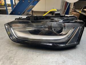 Używane Reflektor lewy Audi A4 Avant (B8) 1.8 TFSI 16V Quattro Cena € 199,00 Procedura marży oferowane przez Poolman autodemontage